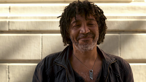 Homeless man standing outdoors