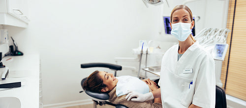 Female dental expert at dentistry
