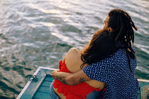 Rearview shot of a young couple bonding affectionately