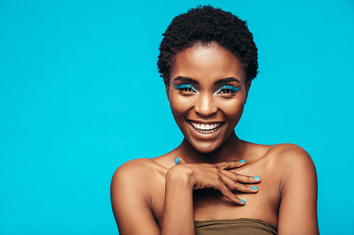Beauty shot of woman with blue eye shadows