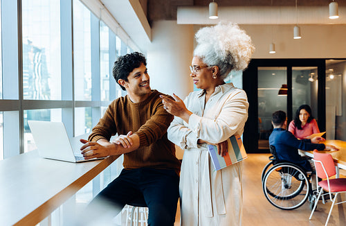 Business friends collaborate at modern workspace