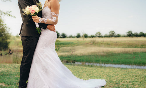 Newlyweds couple together on wedding day