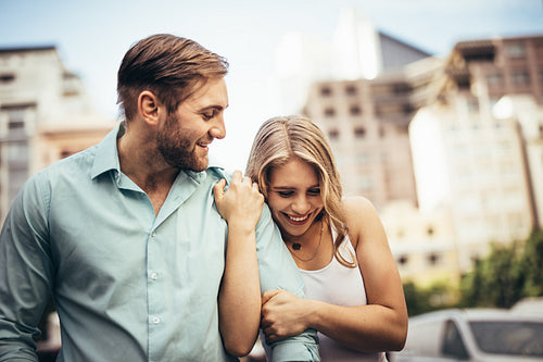 Romantic couple walking on street
