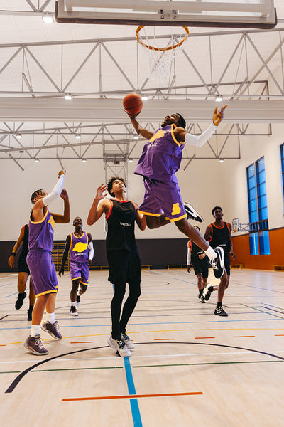 Players competing during a basketball game