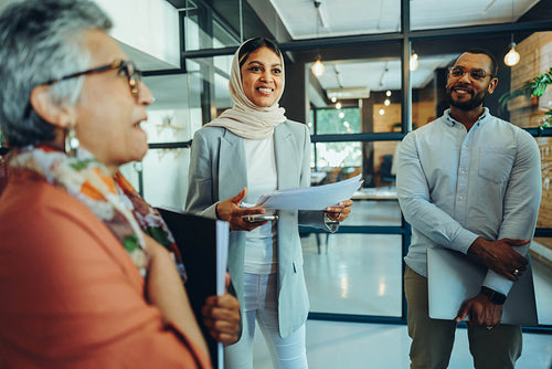 Multicultural business team holding a meeting in an office