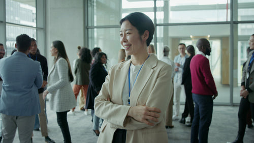 Smiling professional among diverse group