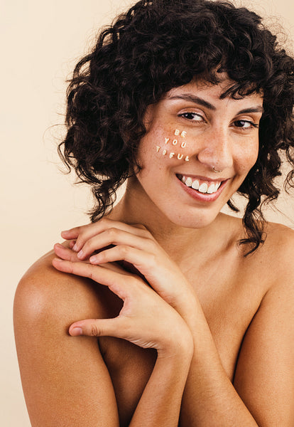 Beautiful young woman embracing her natural body