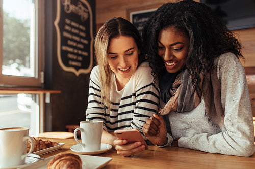 Friends sitting in a cafe