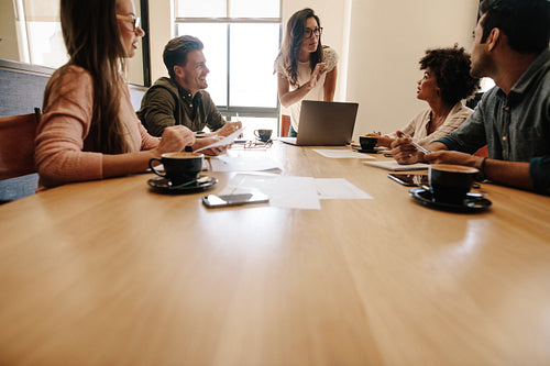 Multi ethnic business team meeting in conference room