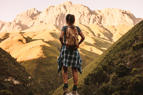 Female hiker looking at the mountain view