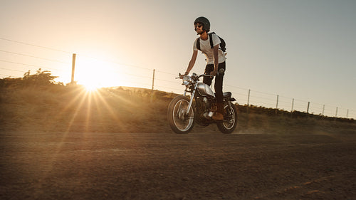 Man riding off-road on vintage bike