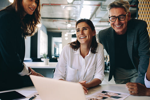 Business people smiling during a meeting in office