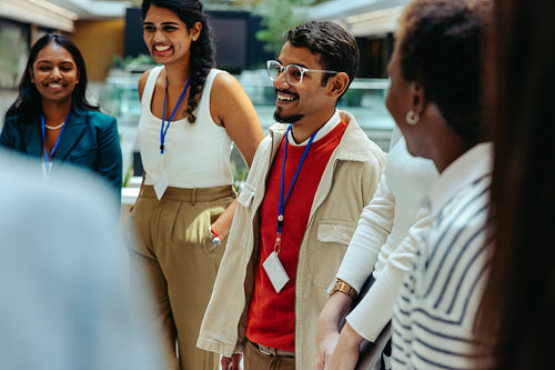 Friendly informal corporate meeting with diverse team