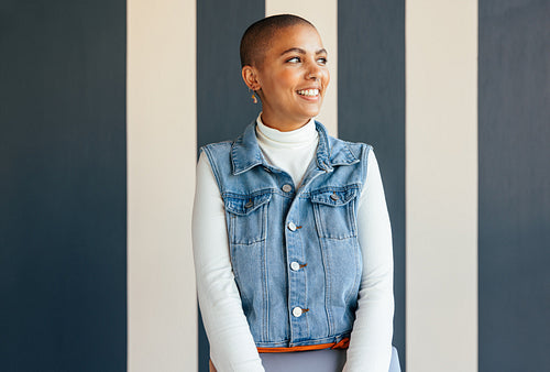 Thoughtful businesswoman looking away with a smile