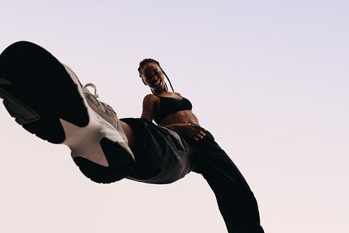 Dynamic generation z dancer celebrating with expressive moves