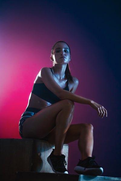 Sportswoman taking break after workout