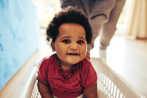 Cute baby enjoying playing at home