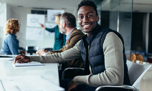 Young businesswoman sitting in meeting room