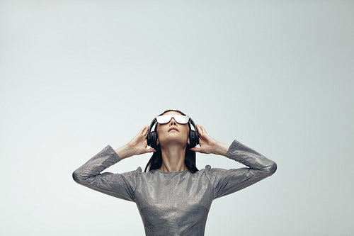 Fashionable female model in futuristic look