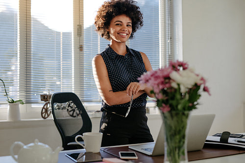 Confident african businesswoman at her workplace