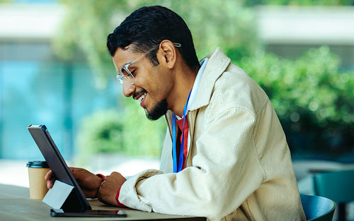 Software engineer working remotely on a digital project outside
