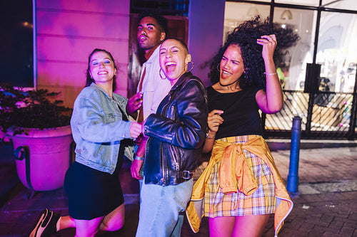 Friends having fun together on a weekend night