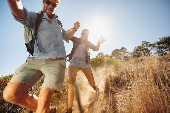 Beautiful woman hiker posing with a map – Jacob Lund Photography Store-  premium stock photo