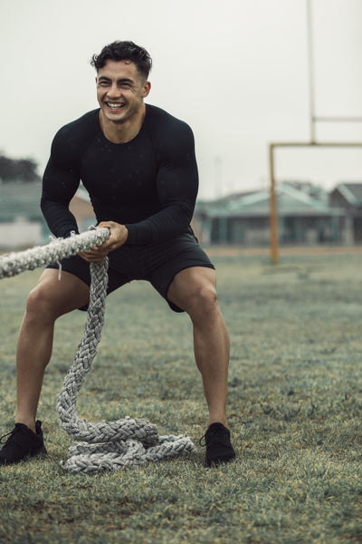 Strong Sportsman Doing A Tire Flip Exercise Stock Photo (201449)  YouWorkForThem