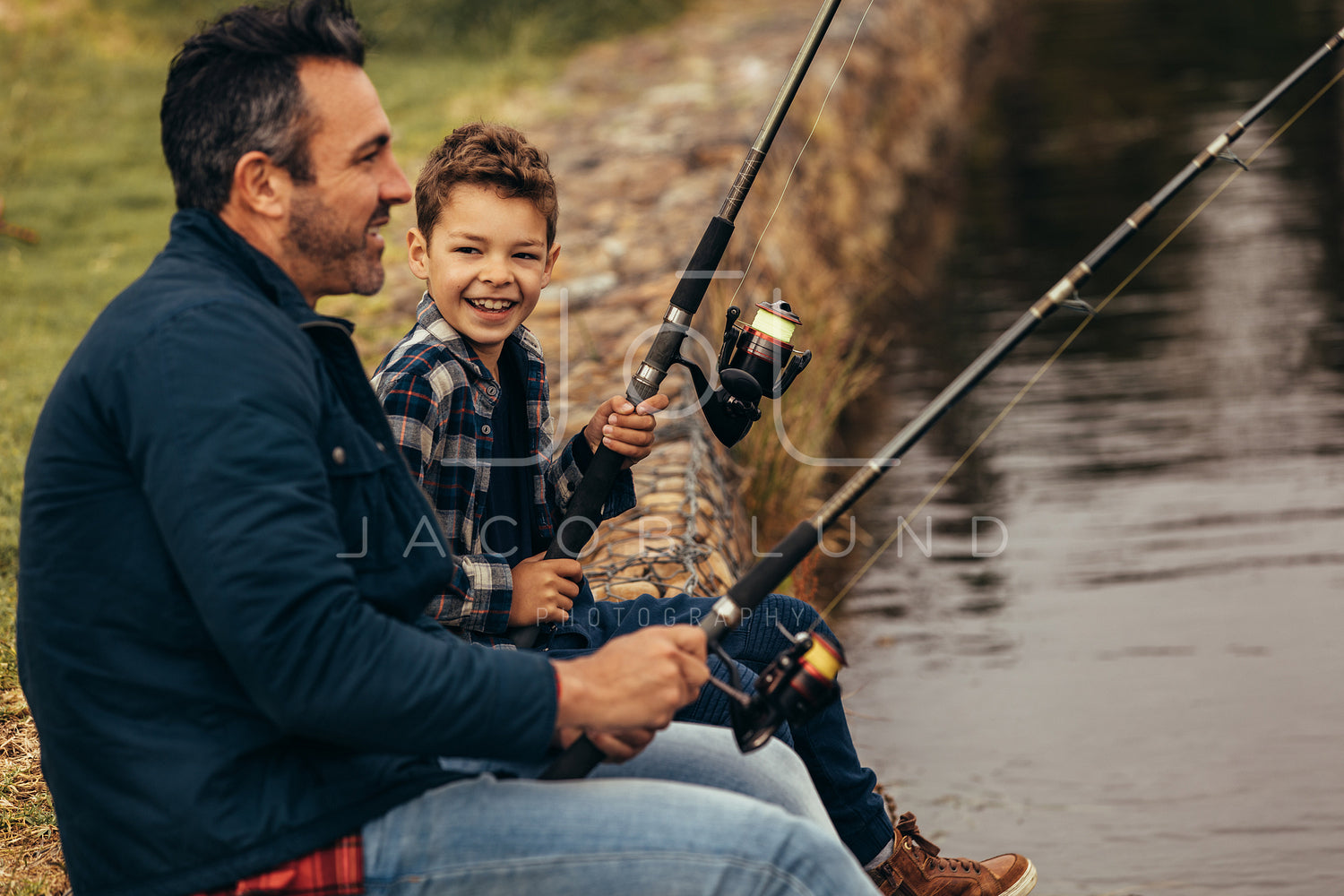 Happy man and kid fishing in a lake – Jacob Lund Photography Store