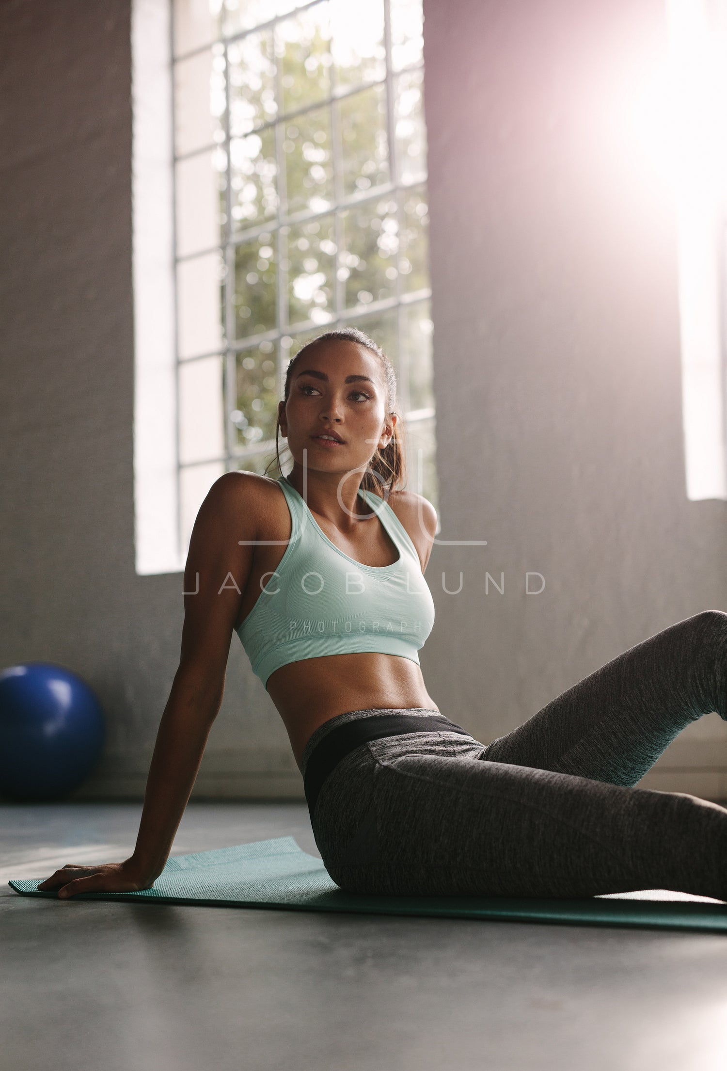 Fitness female resting after workout – Jacob Lund Photography Store-  premium stock photo
