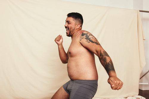 Group Of Shirtless Men Looking At The Camera In A Studio, 42% OFF