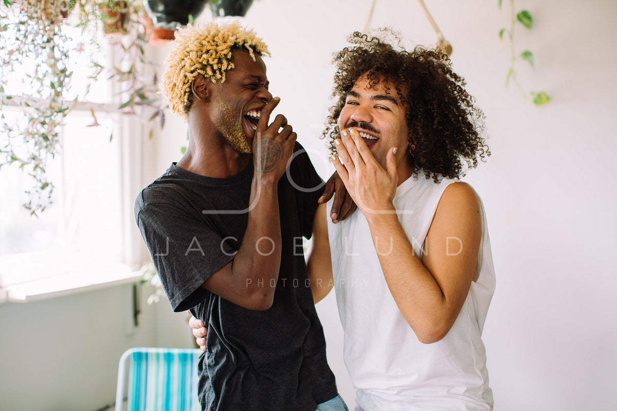 Two Male Lovers Laughing Together At Home – Jacob Lund Photography