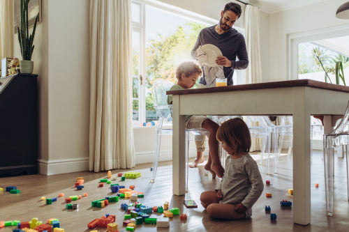 Child playing colorful blocks game with mother – Jacob Lund Photography  Store- premium stock photo