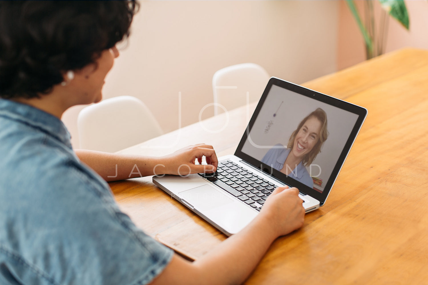 Woman having a video chat with her friend – Jacob Lund Photography Store-  premium stock photo