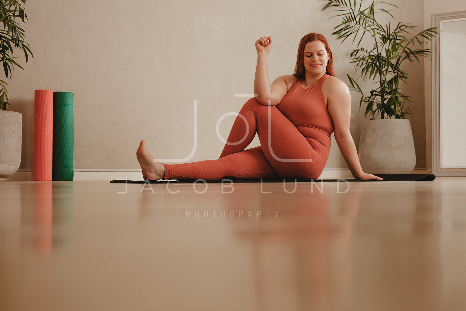 Woman Doing Yoga Workout At Fitness Studio Stock Photo (235002