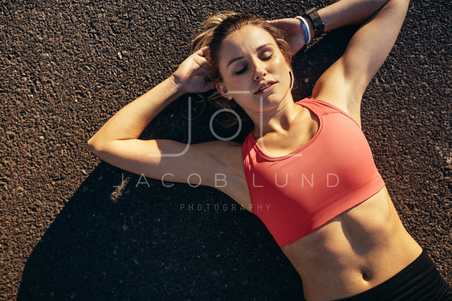 Young Woman in Sports Bra Laying on Bench Stock Photo - Image of