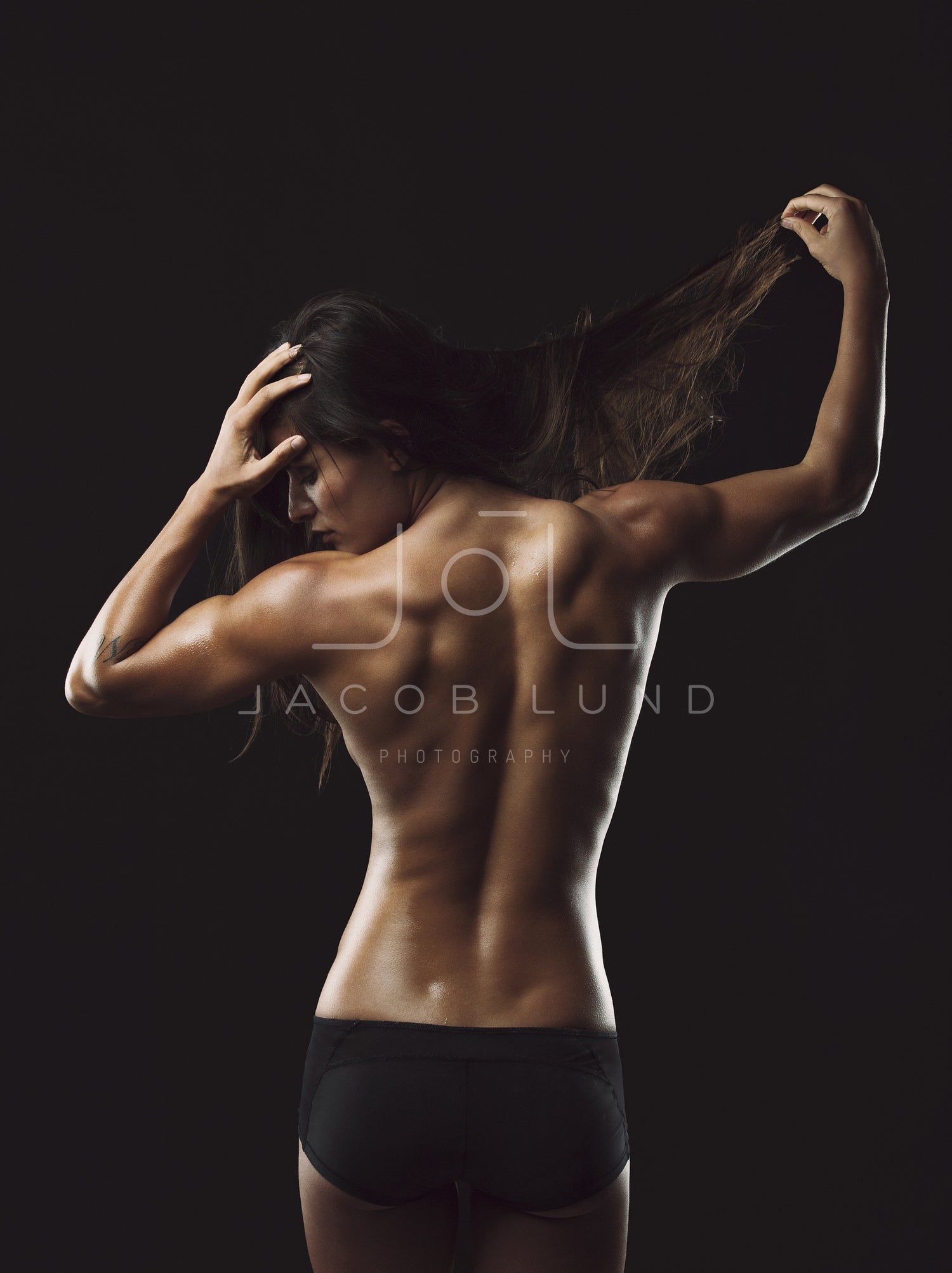 Fit Woman Flexing Back Muscles Stock Photo - Download Image Now