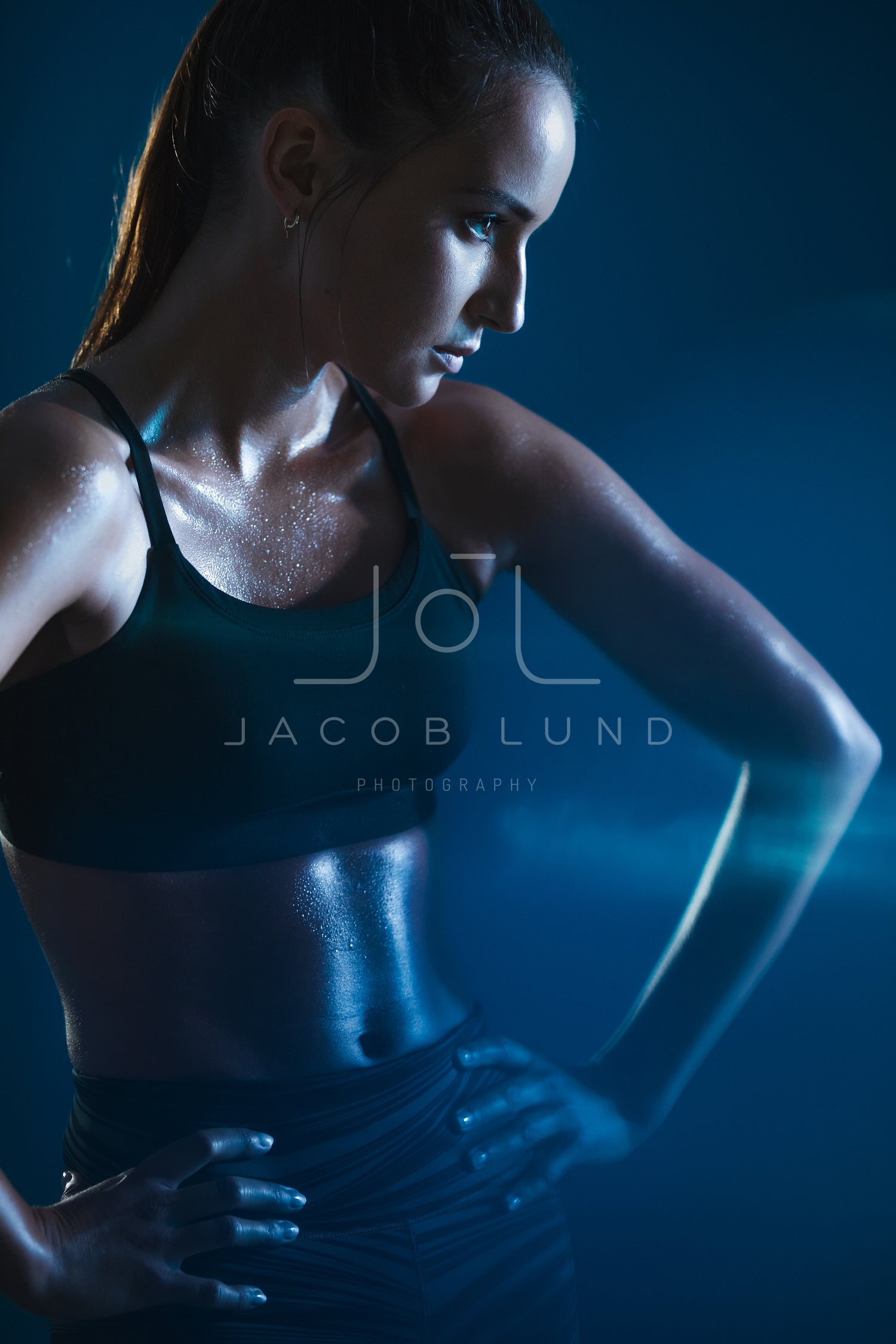 Muscular athletic young woman in sportswear – Jacob Lund Photography Store-  premium stock photo