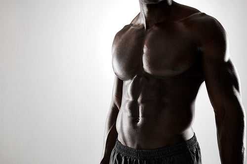 Premium Photo  Young muscular african man shirtless with six pack abs