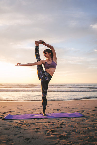 Warrior III yoga pose performed by fitness woman at beach stock photo  (235594) - YouWorkForThem