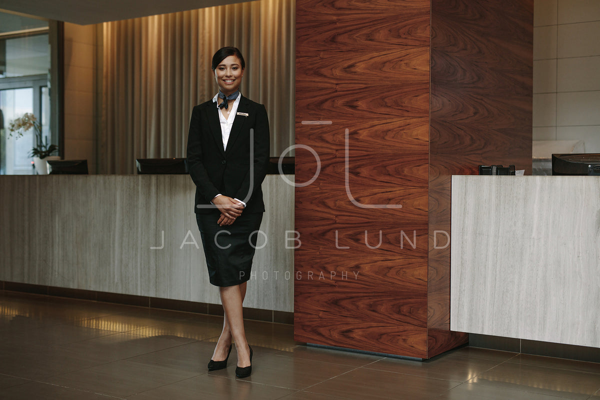 Female hotel receptionist at workplace – Jacob Lund Photography Store ...