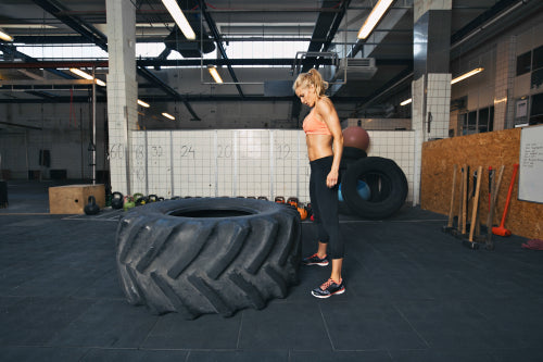 Muscular female athlete exercising with gymnast rings – Jacob Lund  Photography Store- premium stock photo, Fitness Rings For Women 