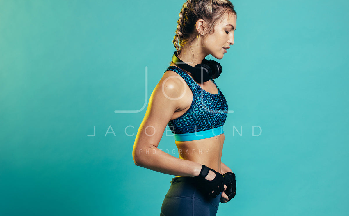 Back of a fit woman athlete in sports bra – Jacob Lund Photography Store-  premium stock photo