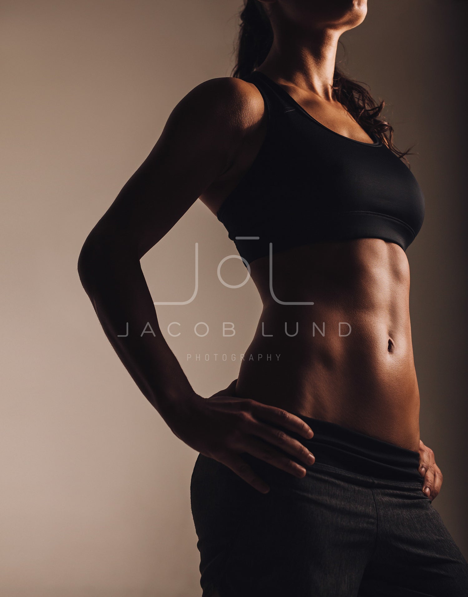 Back of female fitness model – Jacob Lund Photography Store