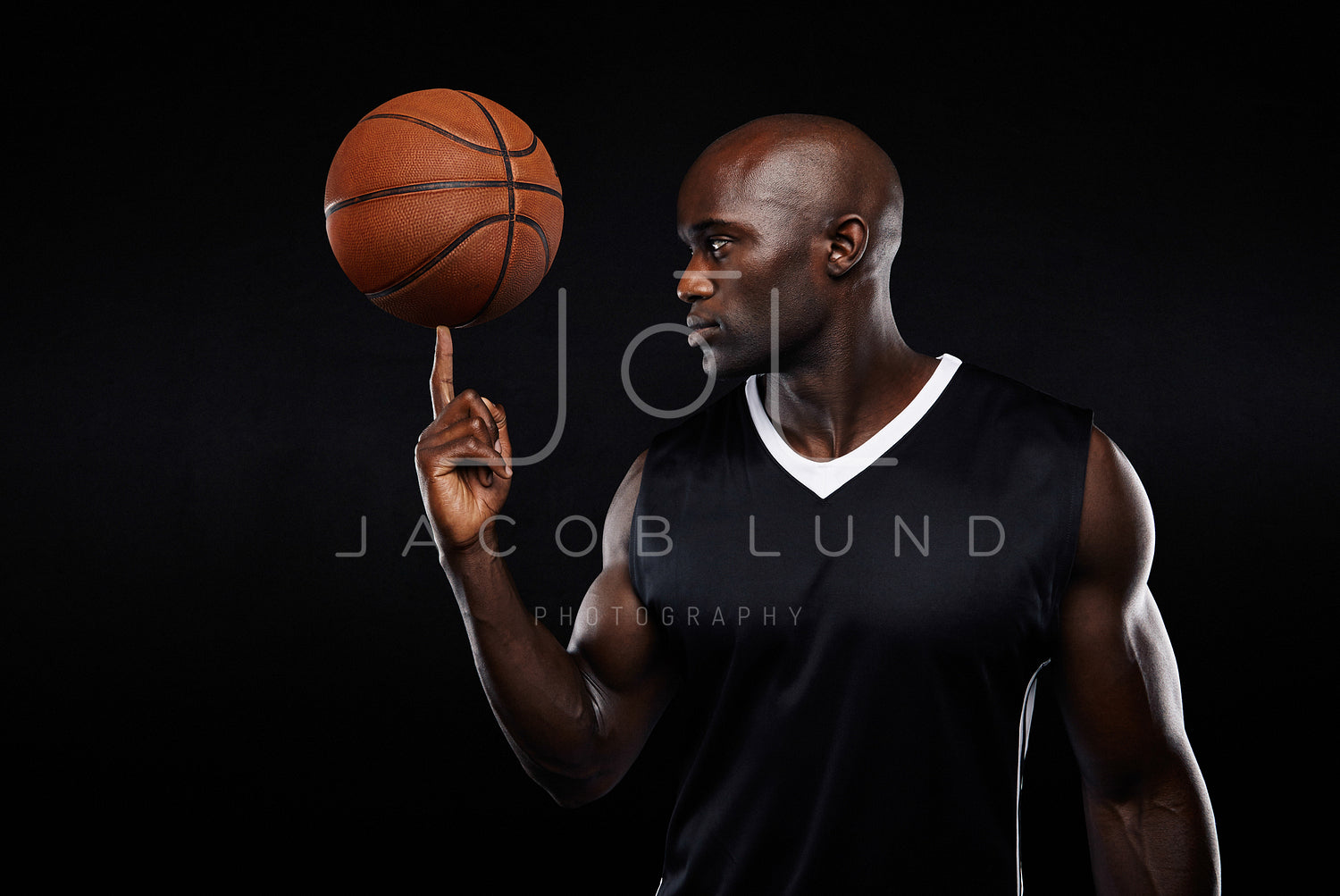 Young african athlete balancing basketball on his finger – Jacob Lund  Photography Store- premium stock photo