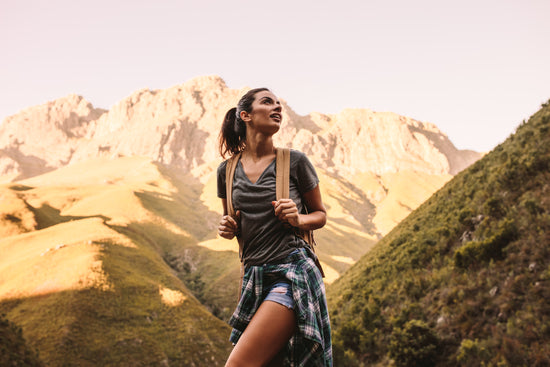 Beautiful woman hiker with a map – Jacob Lund Photography Store- premium  stock photo