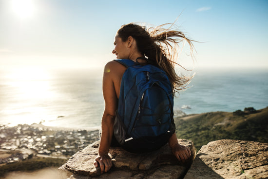 Smiling Woman Hiker On Country Walk by Stocksy Contributor Jacob