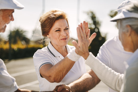 Seniors Playing Mixed Doubles Tennis Game Stock Photo, 52% OFF