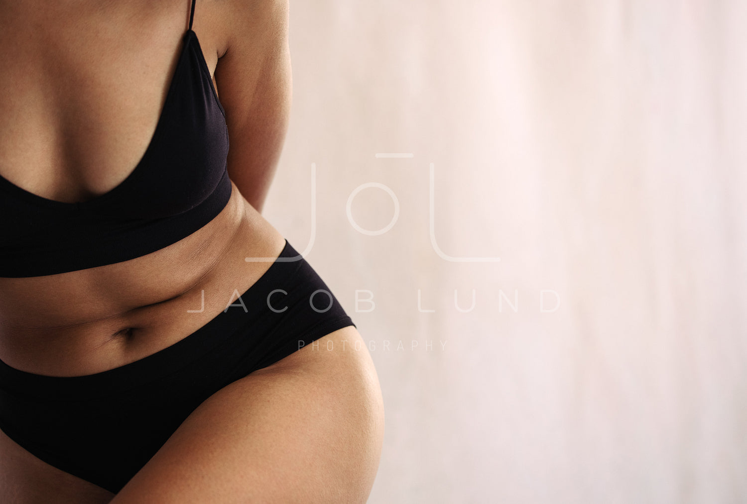 Shot of an anonymous natural female body in black underwear – Jacob Lund  Photography Store- premium stock photo