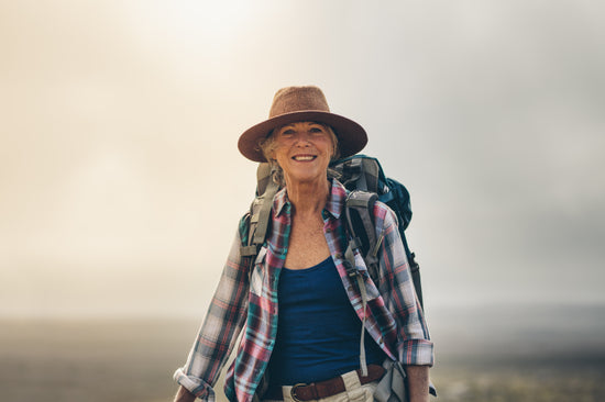 Adventurous Senior Woman On A Hiking Trip Stock Photo (166390